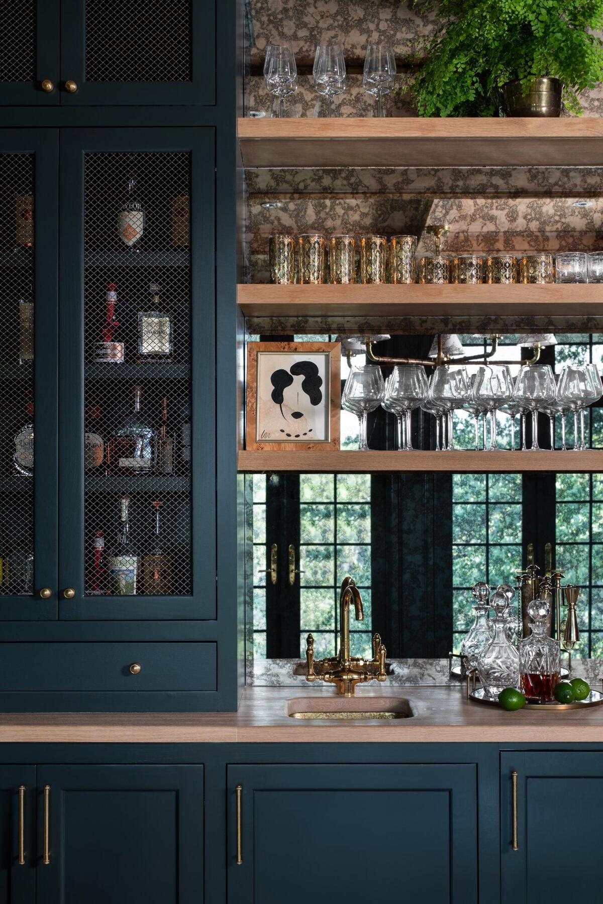 Custom wet bar with wire mesh cabinets